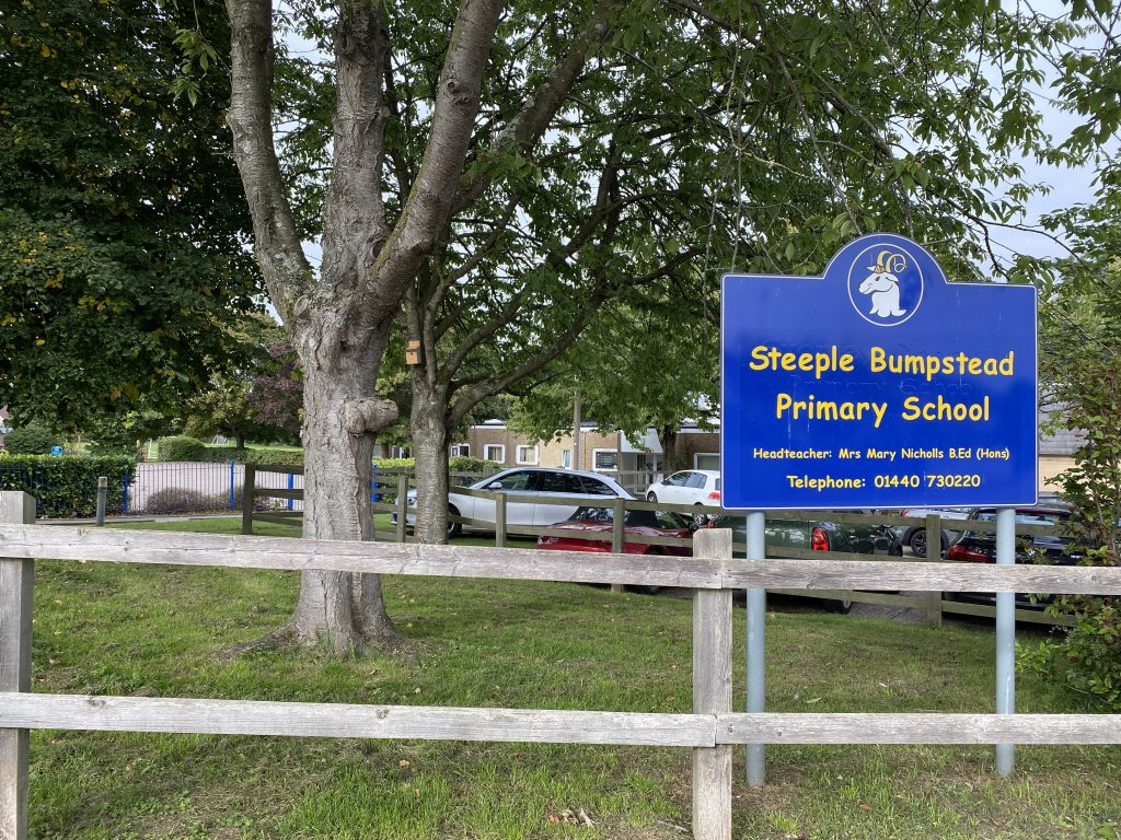 school sign in front of school